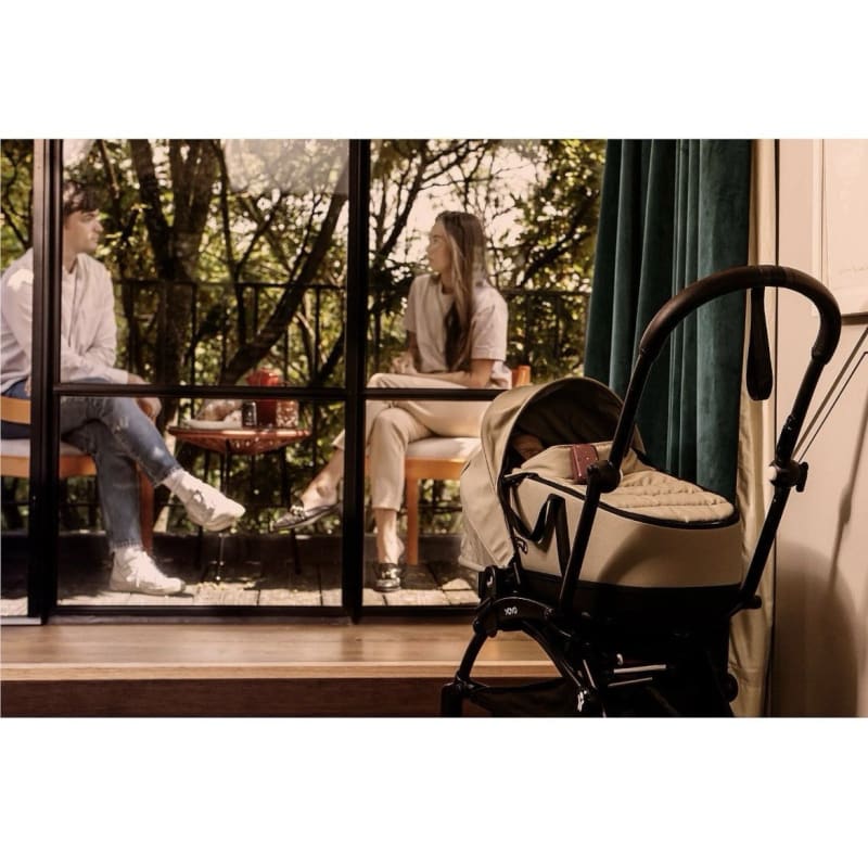 Schwarzer Babywagen im Produkt Motorola PIP12 TRAVEL Babyphone mit Tasche